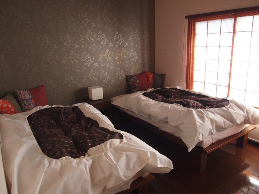 Tsumugi Inn Kyoto Rum bild